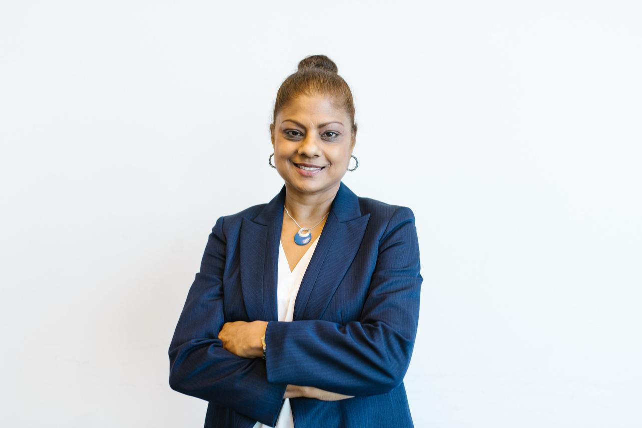 Woman in Blue Blazer Smiling